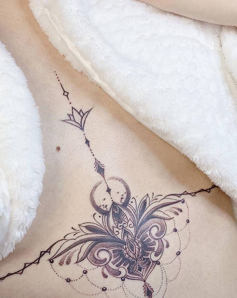 胸花纹身图片_胸部点刺胸花纹身图案