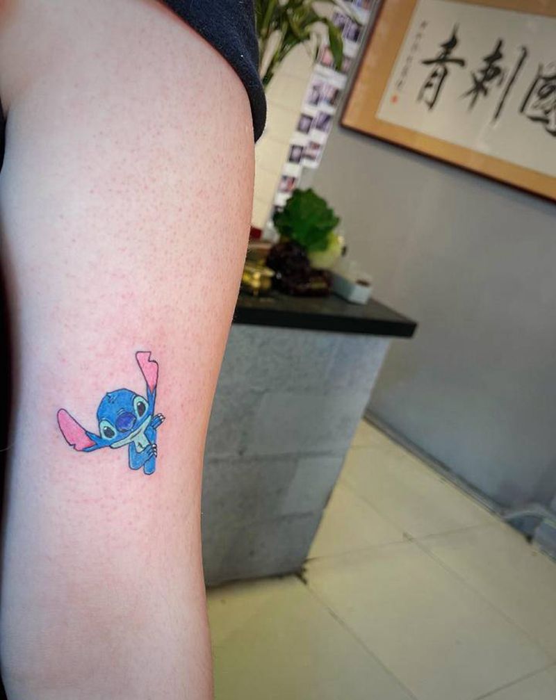 史迪仔纹身图片_手臂水彩纹身图案