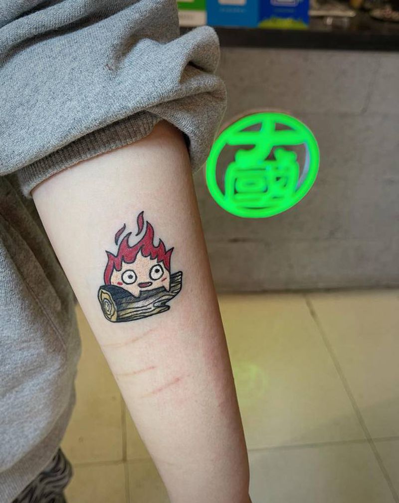 卡通纹身图片_手臂水彩纹身图案