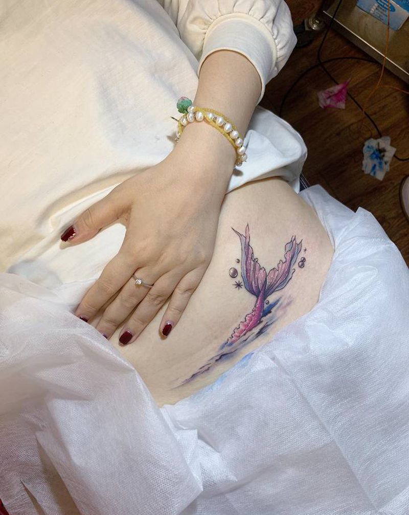 鱼尾遮盖疤痕纹身图片_腹部水彩纹身图案