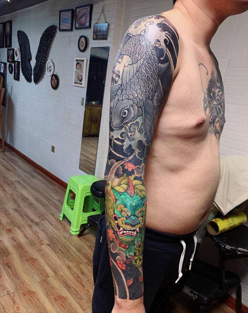 花臂纹身图片_手臂新传统纹身图案