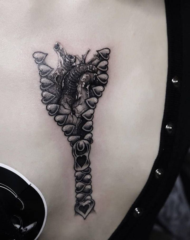 拉锁里面的心脏纹身图片_点刺欧美写实纹身图案
