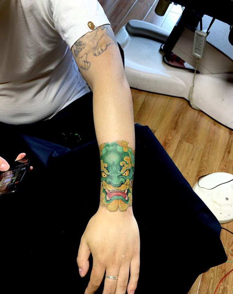 唐狮纹身图片_手臂新传统唐狮纹身图案