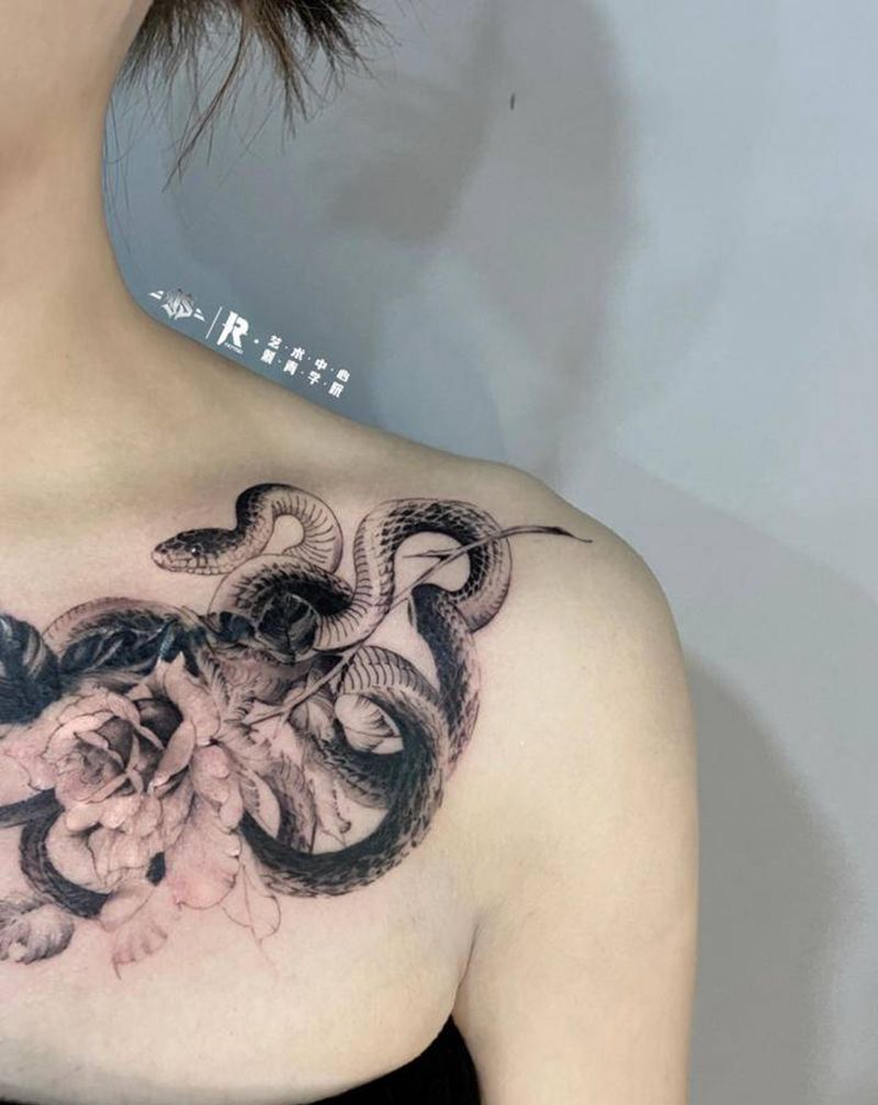 牡丹蛇纹身图片_胸部遮盖纹身图案