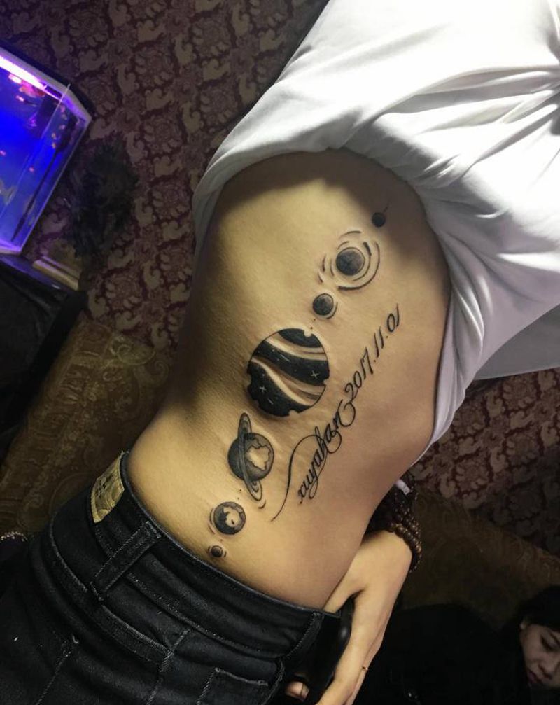 星球纹身图片_腹部纹身图案