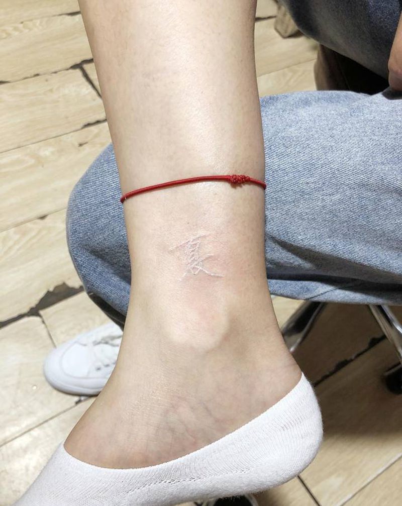 字纹身图片_腿部纹身图案