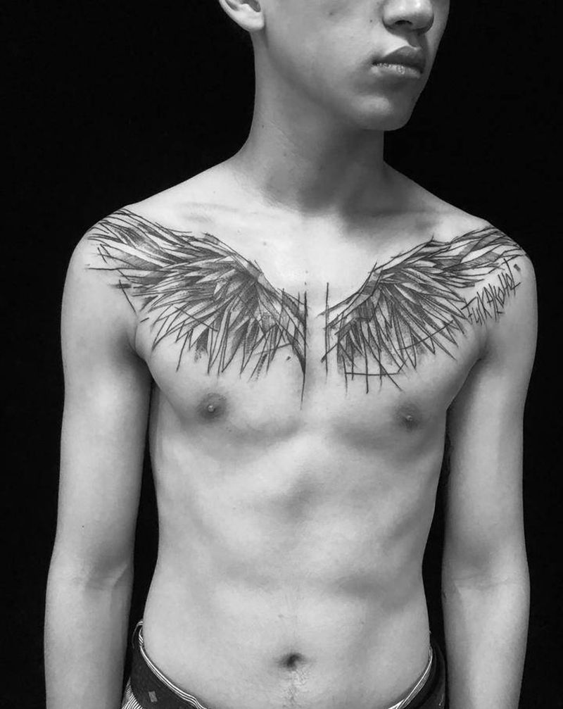 几何点刺翅膀纹身图片_胸部点刺纹身图案