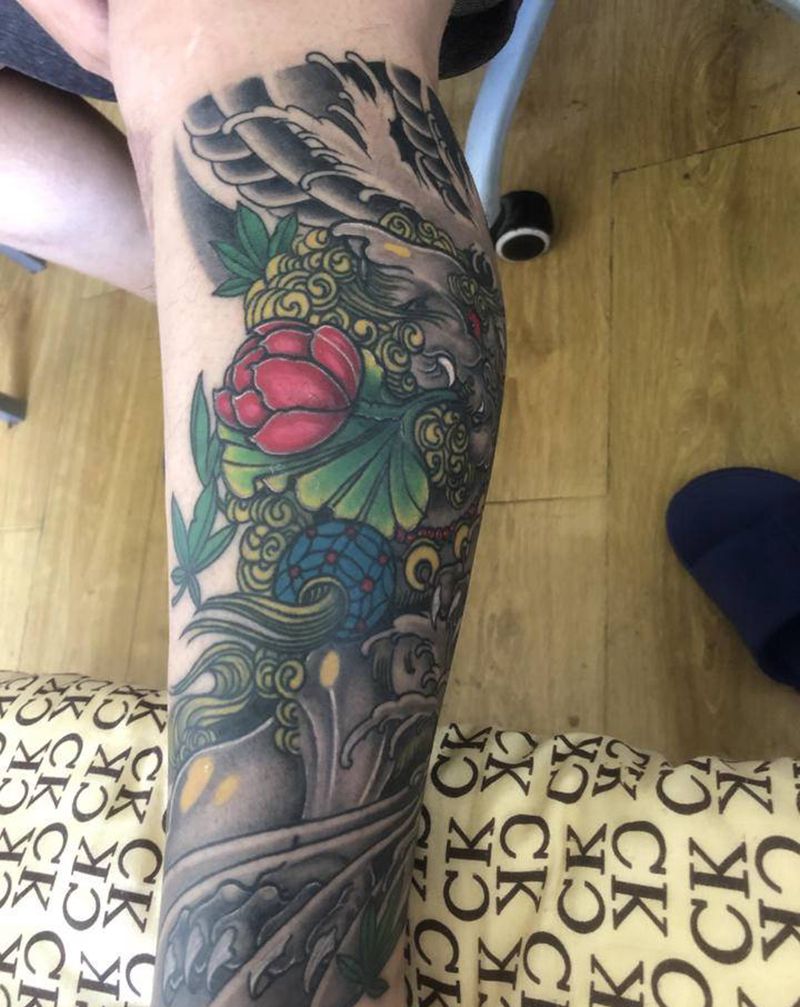 老传统唐狮纹身图片_腿部纹身图案