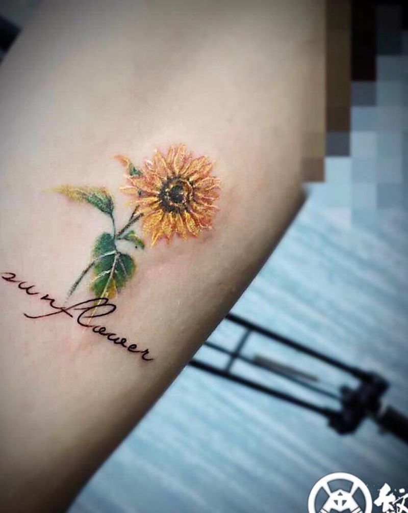 向日葵纹身图片_手臂水彩欧美写实纹身图案