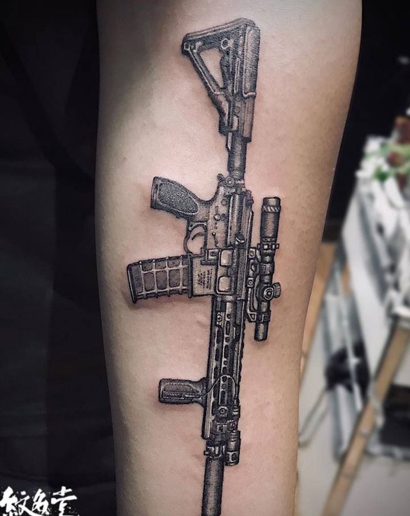 细节决定一切纹身图片_手臂欧美写实枪纹身图案