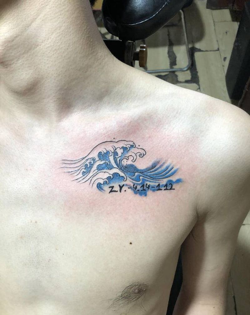 浪纹身图片_胸部纹身图案