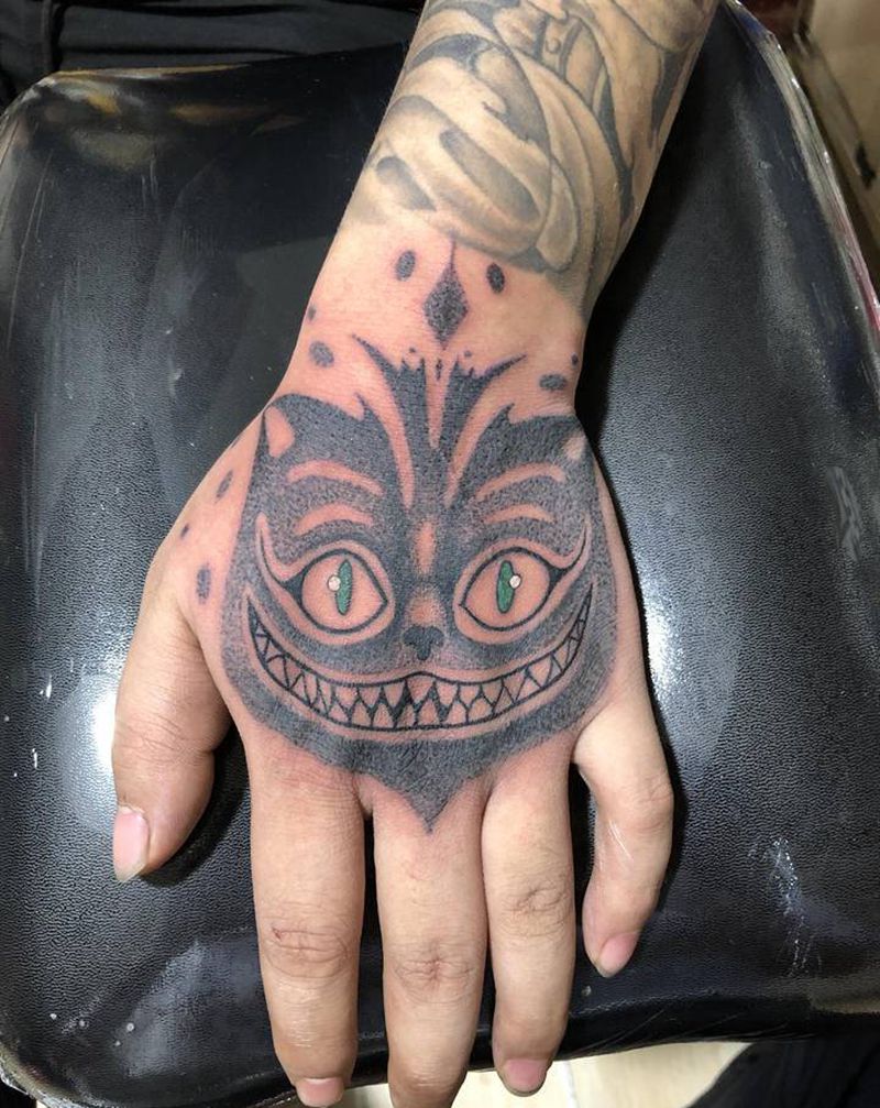 爱丽丝梦游仙境里的这个猫叫啥？纹身图片_手部纹身图案