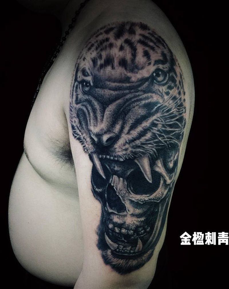 虎骷髅纹身图片_肩部手臂欧美写实点刺纹身图案