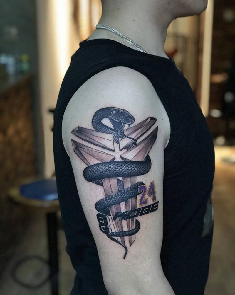 黑曼巴纹身图片_手臂欧美写实纹身图案