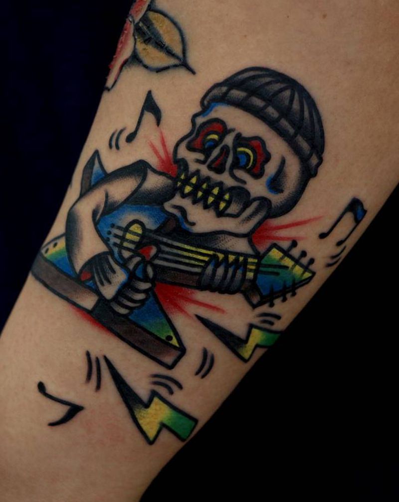 快乐的rocker纹身图片_手臂Old School纹身图案