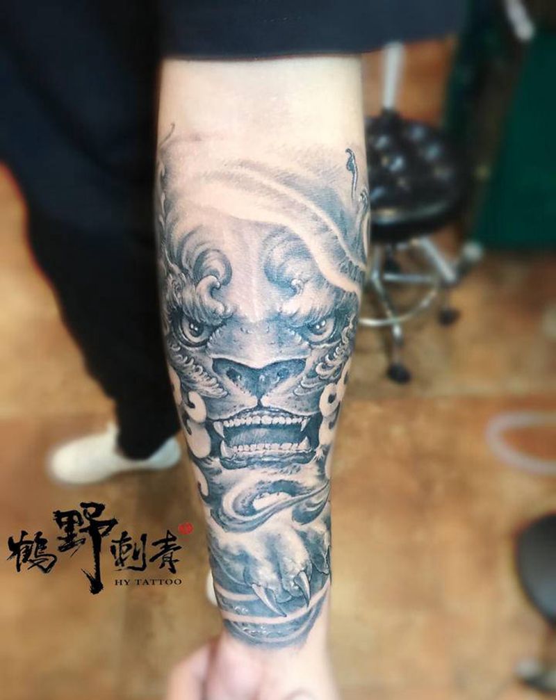 唐狮纹身图片_手臂新传统唐狮纹身图案