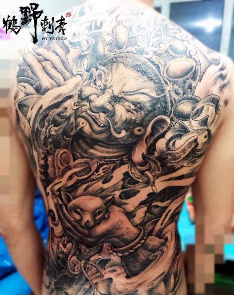 黄财神纹身图片_背部新传统黄财神纹身图案