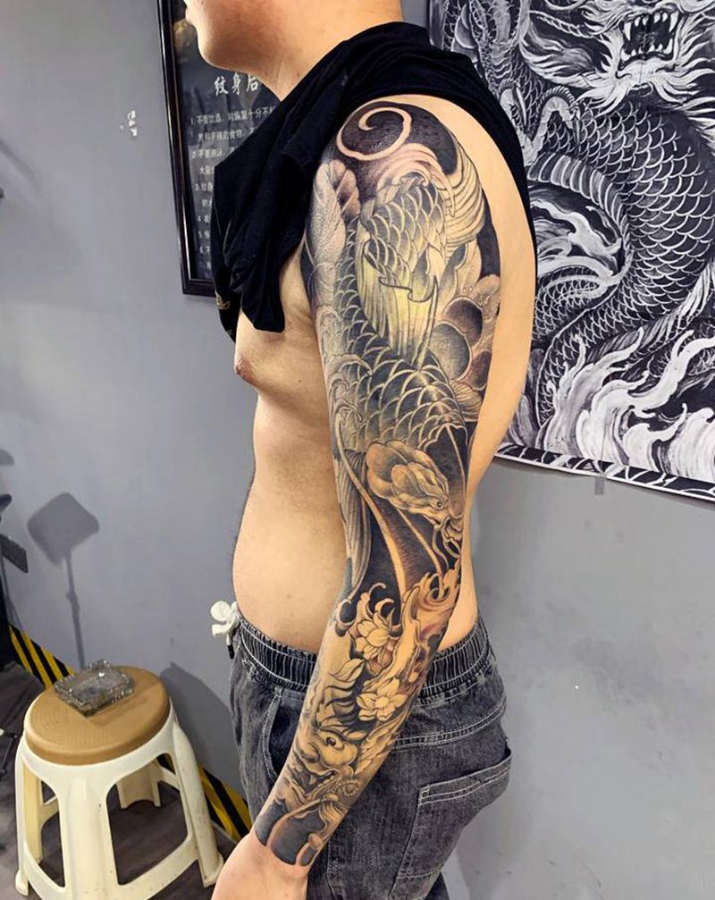 覆盖做花臂纹身图片_手臂新传统纹身图案