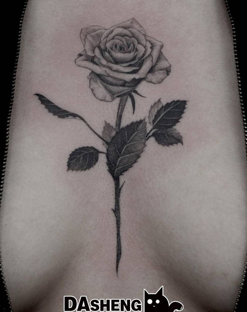 Ross纹身图片_胸部点刺纹身图案