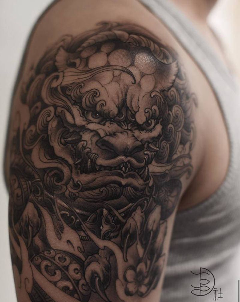 大臂唐狮作品纹身图片_手臂新传统纹身图案