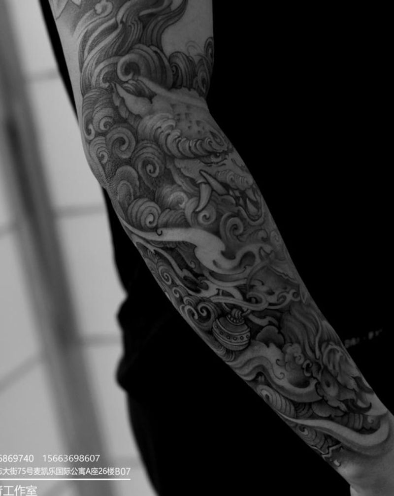 唐狮花臂纹身图片_手臂新传统纹身图案