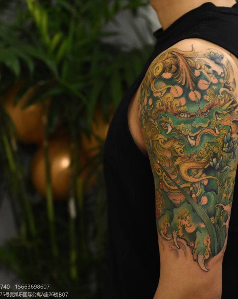 唐狮纹身图片_手臂新传统纹身图案