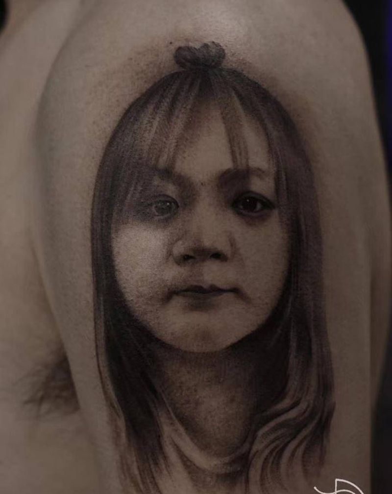 三三的肖像作品纹身图片_手臂欧美写实纹身图案