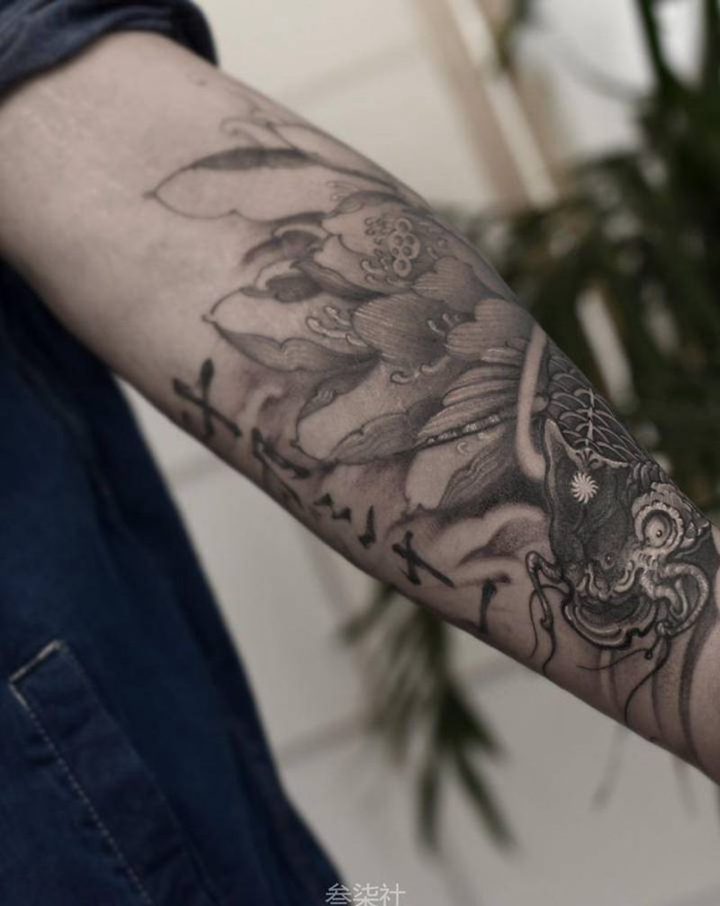 鱼纹身图片_手臂新传统纹身图案
