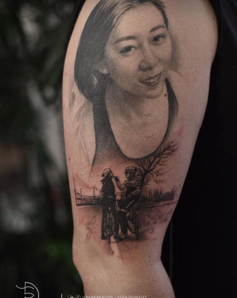 夕阳下纹身图片_手臂欧美写实纹身图案