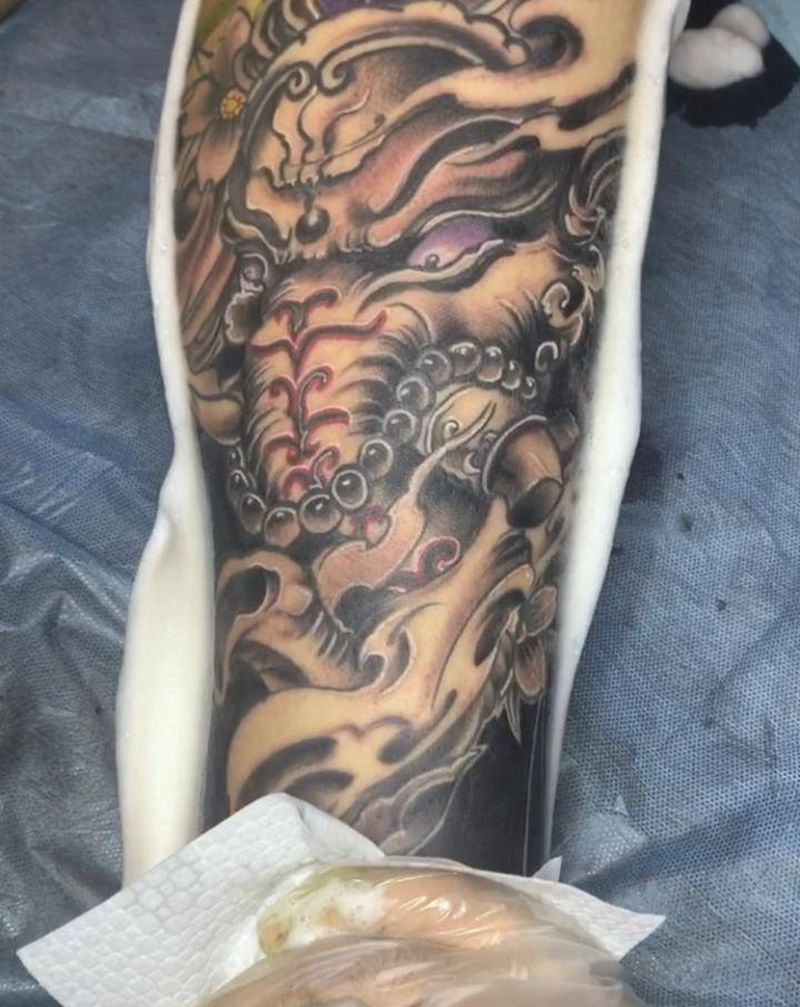 新传统象神纹身图片_腿部新传统纹身图案