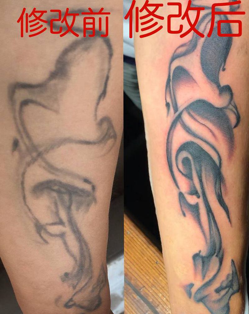水墨纹身图片_手臂水墨纹身图案