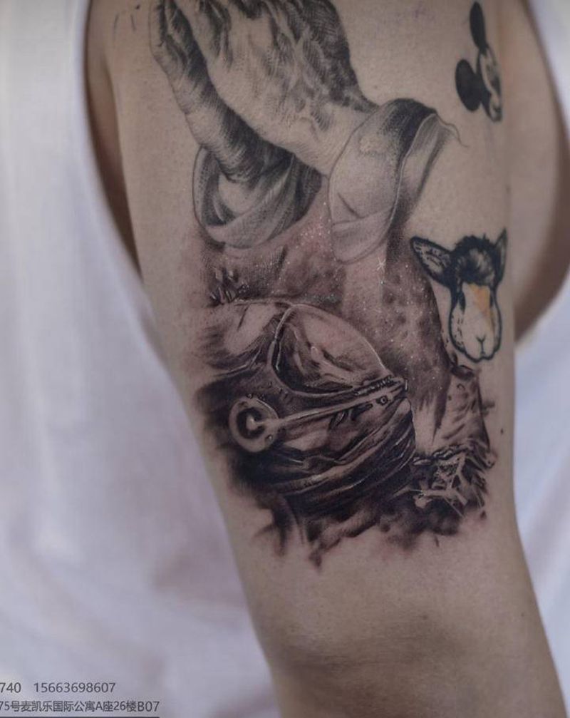 太空纹身图片_手臂欧美写实纹身图案