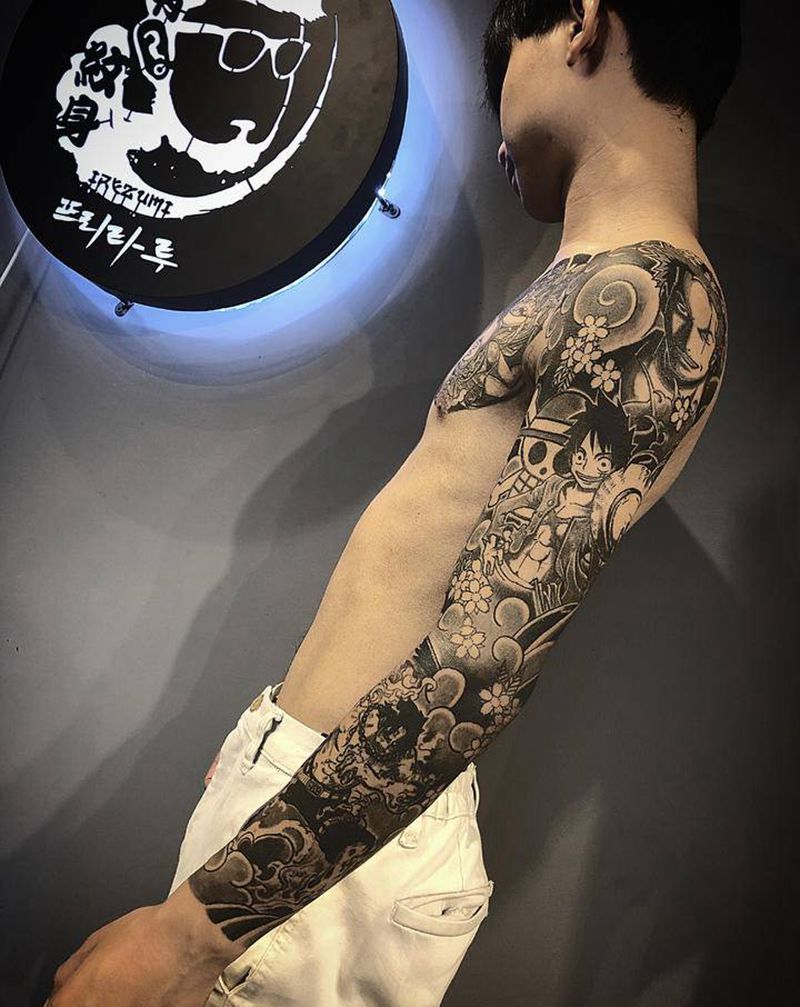 海贼王主题花臂半甲完成纹身图片_手臂胸部纹身图案