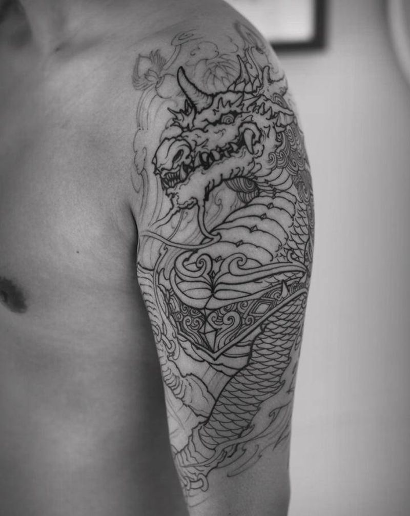 大臂麒麟纹身图片_手臂新传统纹身图案