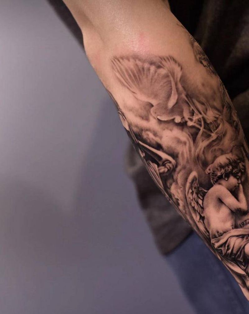 和平鸽纹身图片_手臂欧美写实纹身图案