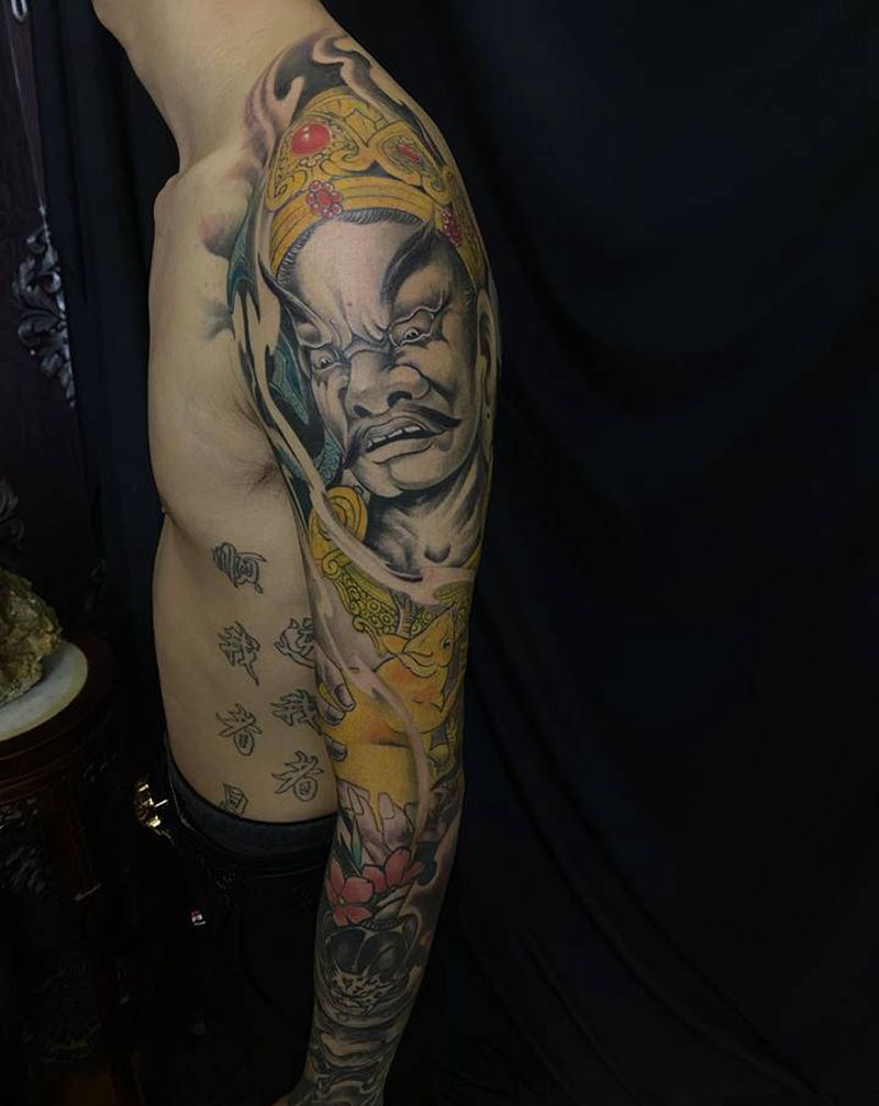 黄财神 花臂纹身图片_手臂新传统纹身图案