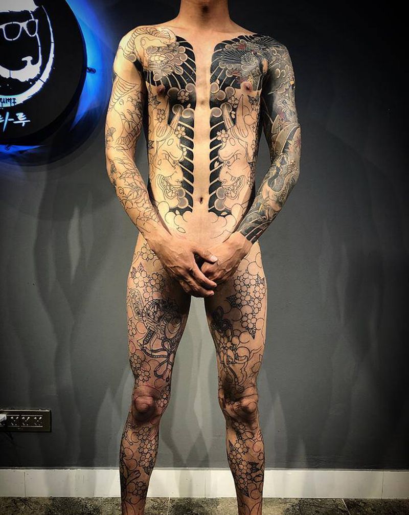 通体进行中纹身图片_手臂背部纹身图案