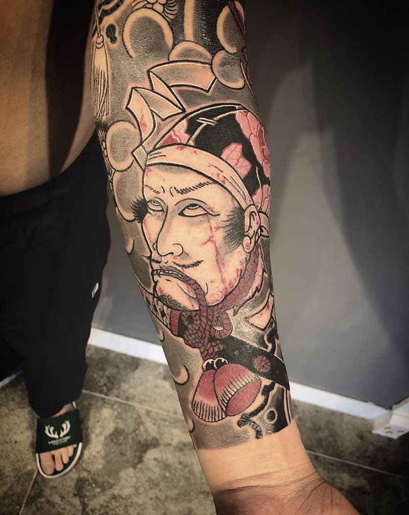 生首完成纹身图片_手臂纹身图案