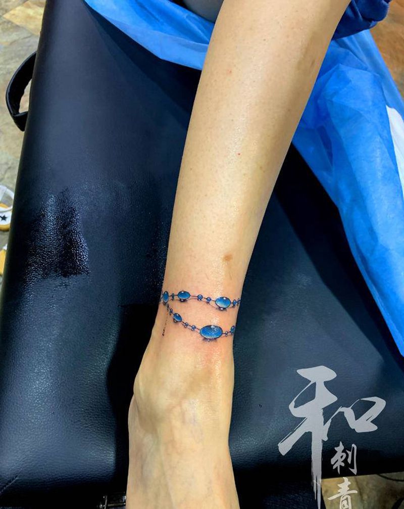 脚链纹身图片_脚部手臂欧美写实纹身图案