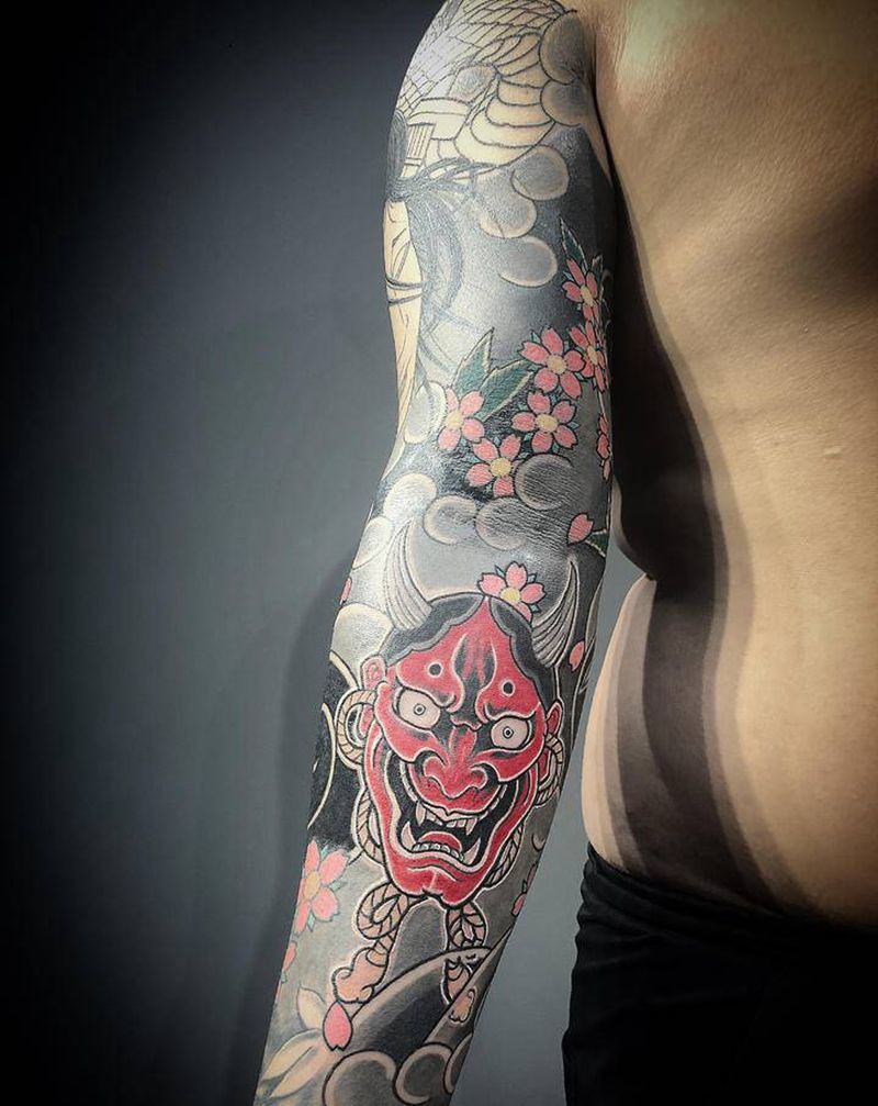 传统花臂进行中纹身图片_手臂纹身图案