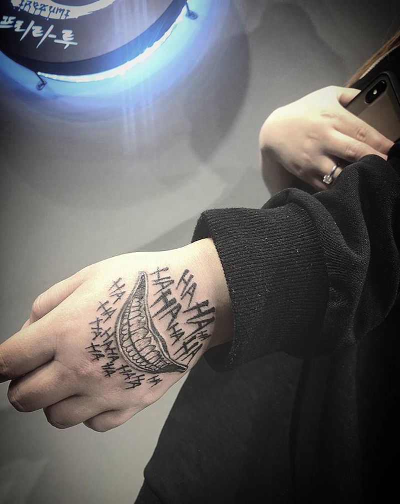 疤痕覆盖纹身图片_手部纹身图案