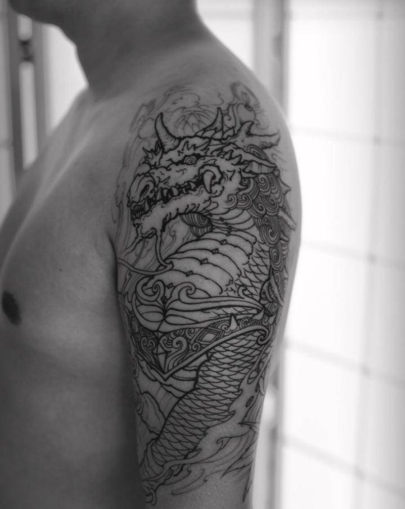麒麟纹身图片_手臂新传统麒麟包大臂遮盖纹身图案