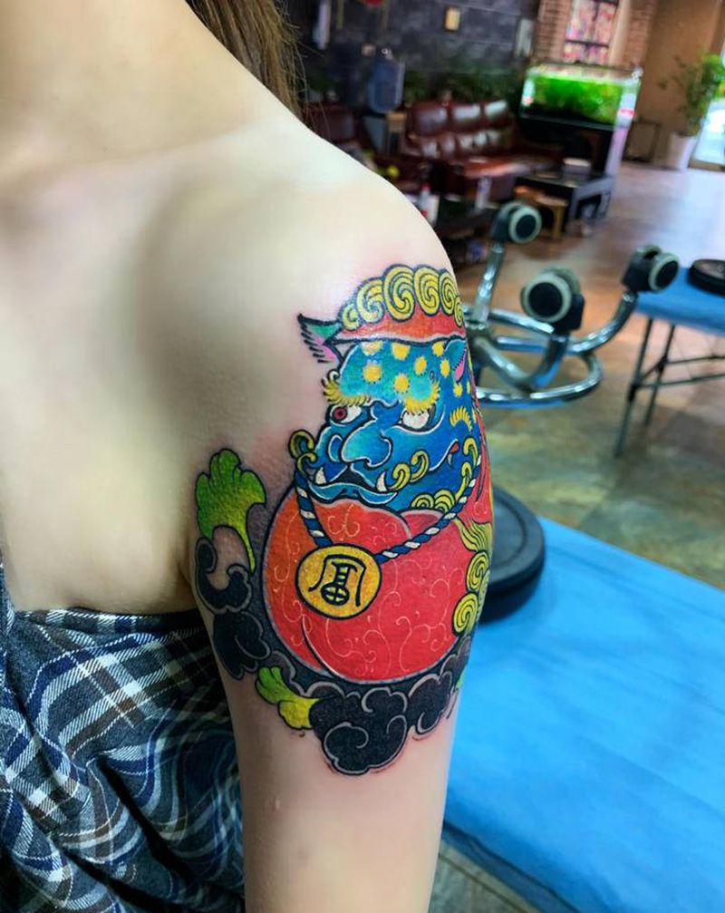 唐狮子纹身图片_手部腹部纹身图案