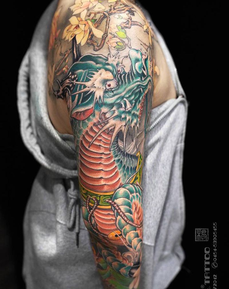 《玉麒麟》纹身图片_手臂手部老传统新传统彩色招财花臂纹身图案