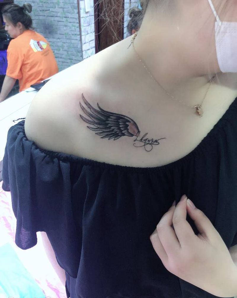 翅膀纹身图片_胸部新传统纹身图案