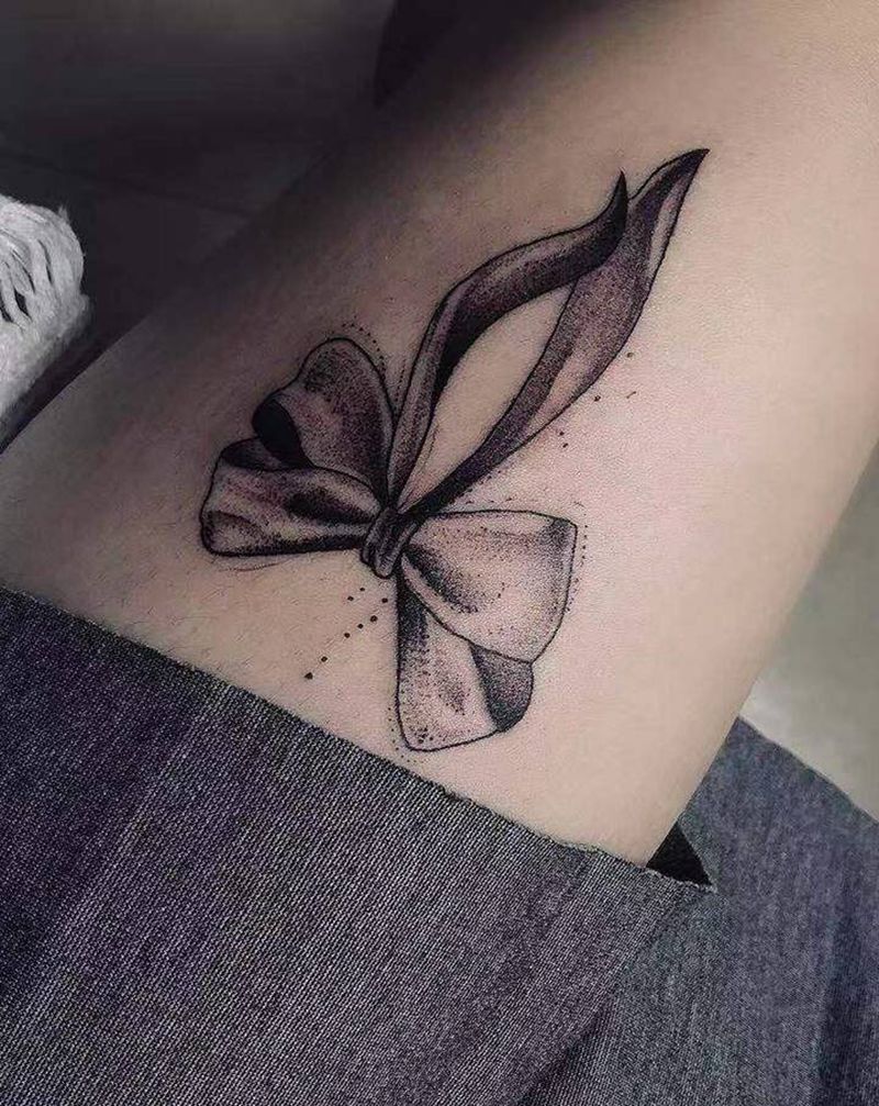 蝴蝶结纹身图片_腿部点刺纹身图案