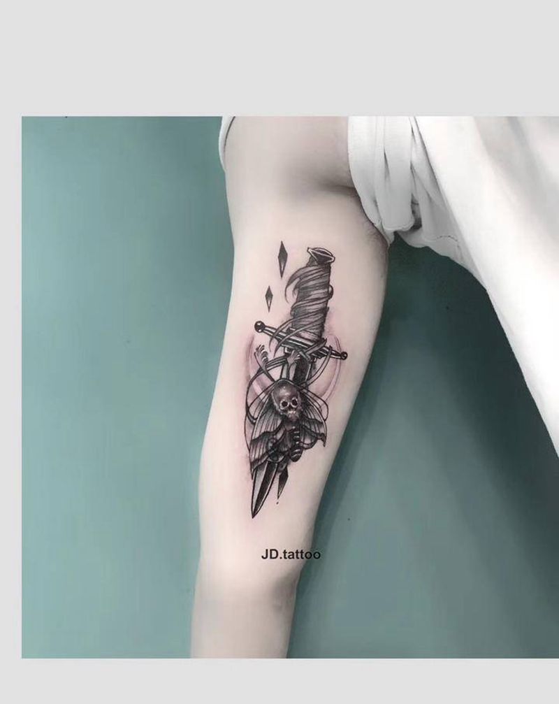 遮盖作品纹身图片_手臂匕首纹身图案
