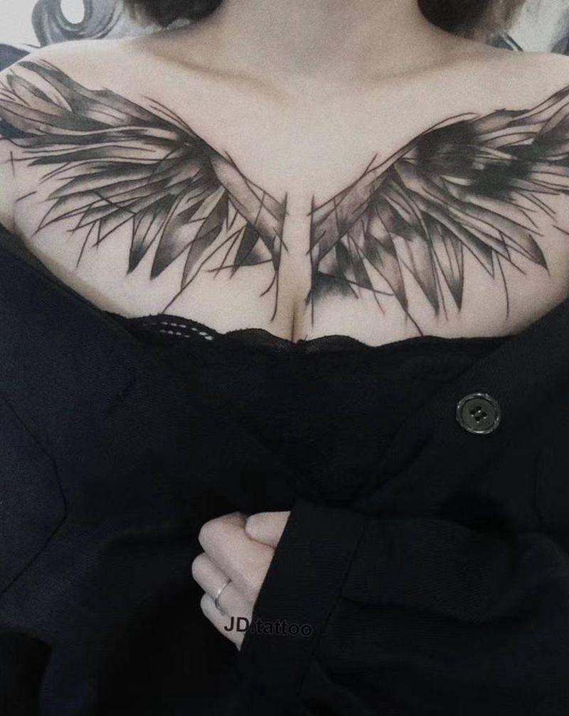 花胸翅膀遮盖纹身图片_胸部翅膀纹身图案