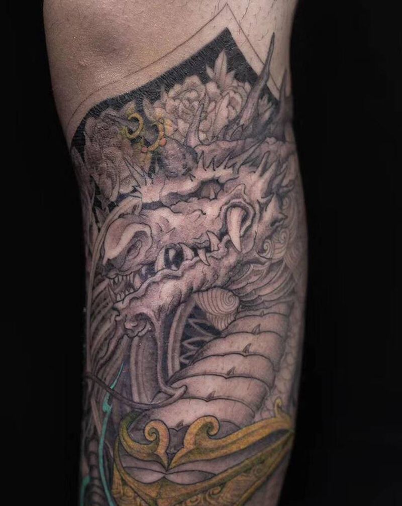 小腿麒麟纹身图片_腿部新传统麒麟纹身图案