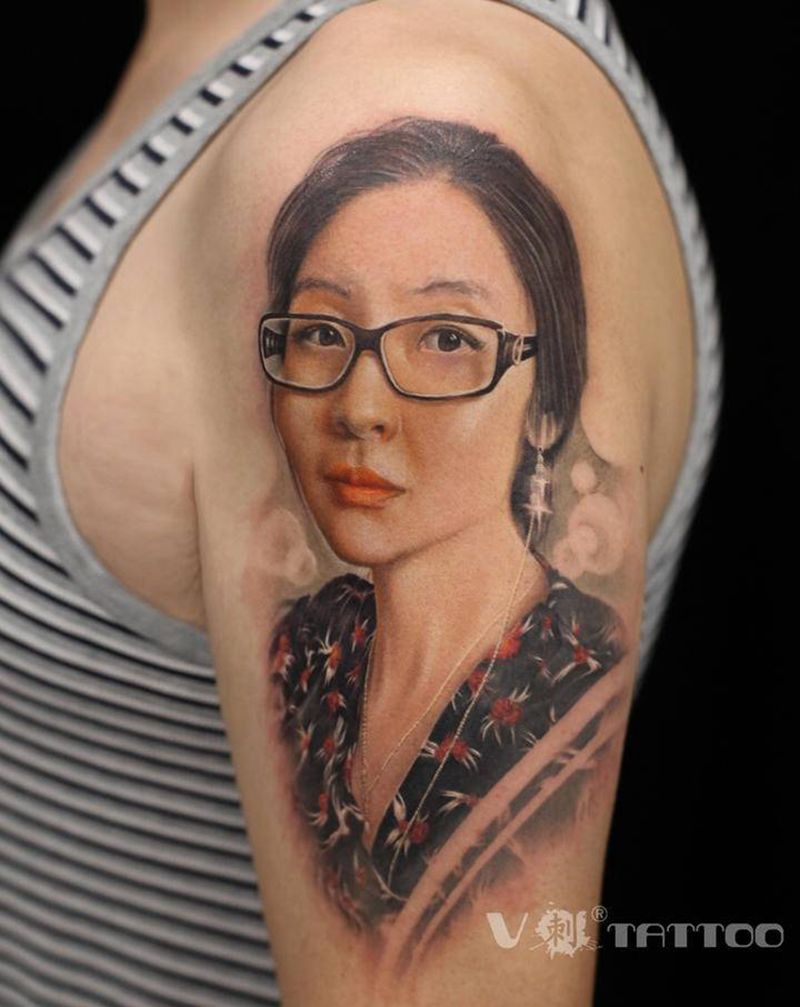 肖像纹身纹身图片_手臂欧美写实肖像哈尔滨照片纹身图案
